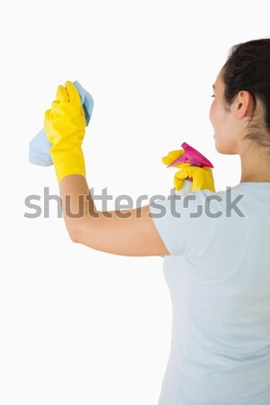Woman cleaning a window on a white background Stock photo © wavebreak_media