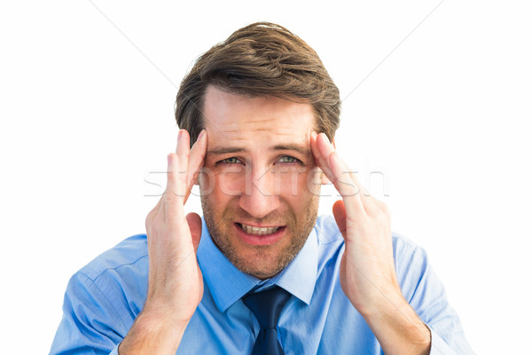 Young businessman with severe headache Stock photo © wavebreak_media