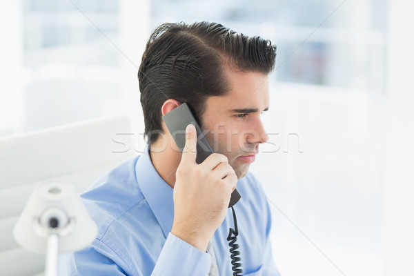 Thoughtful businessman having phone call Stock photo © wavebreak_media