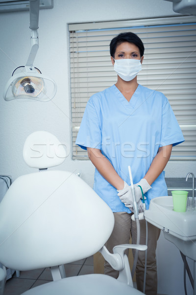 Femenino dentista mascarilla quirúrgica retrato Trabajo Foto stock © wavebreak_media