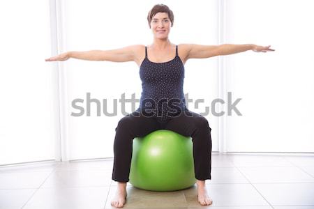 Pregnant woman keeping in shape Stock photo © wavebreak_media
