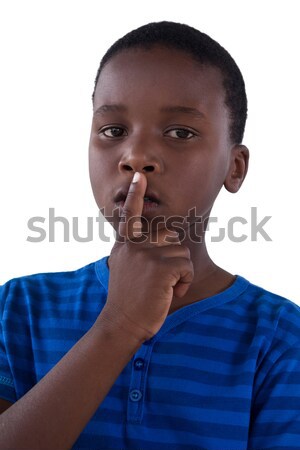 Portrait of boy with finger on lips Stock photo © wavebreak_media