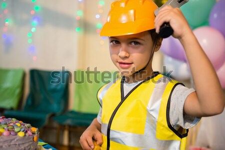 Boy pretending as a worker during birthday party Stock photo © wavebreak_media