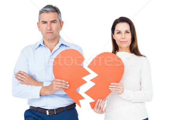  Couple holding broken heart Stock photo © wavebreak_media