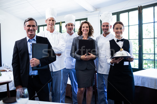 Felice ristorante squadra piedi insieme ritratto Foto d'archivio © wavebreak_media