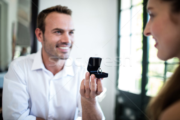 男子 女子 提供 訂婚戒指 餐廳 快樂 商業照片 © wavebreak_media