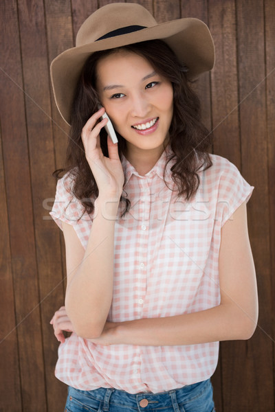 Hipster woman calling someone Stock photo © wavebreak_media