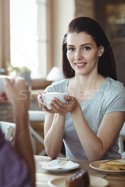 女子 杯 咖啡 麵包店 購物 商業照片 © wavebreak_media