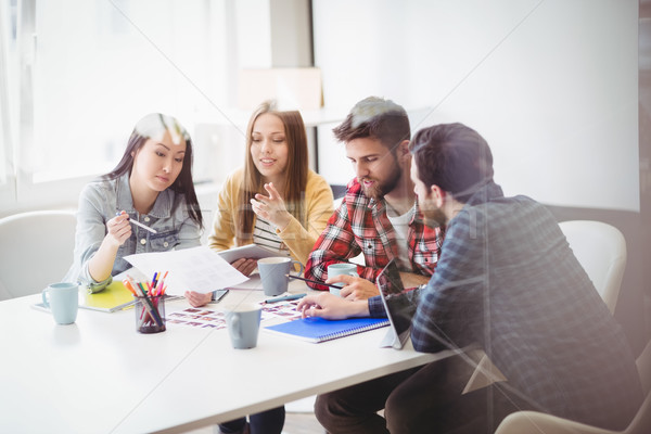 Editors interacting in meeting room Stock photo © wavebreak_media