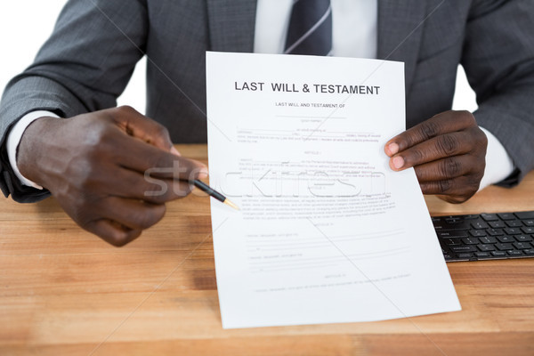 Businessman showing Last Will & Testament document Stock photo © wavebreak_media
