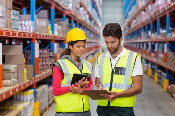 Stockfoto: Magazijn · werknemers · bespreken · werken · man