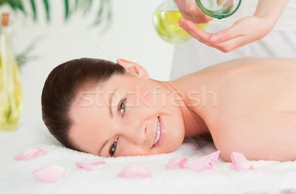 Mooie vrouw Maakt een reservekopie spa bloemen handen Stockfoto © wavebreak_media