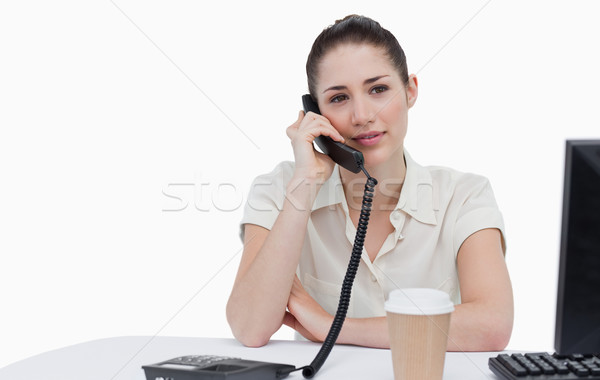 Secretary answering the phone against a white background Stock photo © wavebreak_media