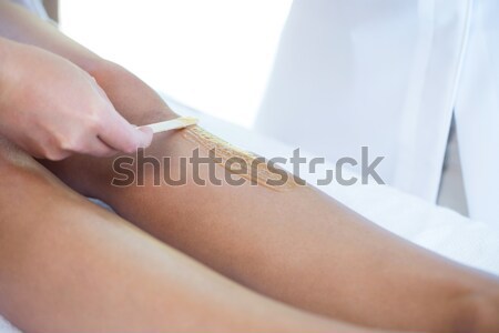 Doctor pressing the side of a foot in a room Stock photo © wavebreak_media