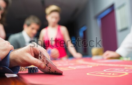Uomo bene mano poker gioco casino Foto d'archivio © wavebreak_media