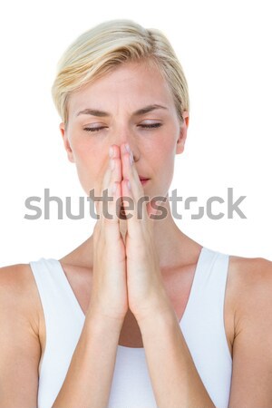 Attractive blonde woman praying Stock photo © wavebreak_media