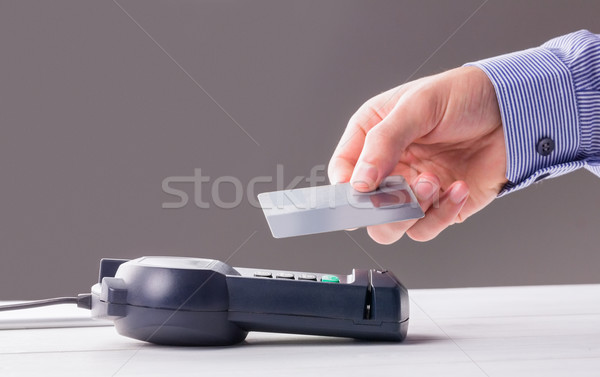 Man using card to express pay  Stock photo © wavebreak_media