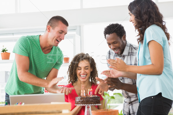 Souriant collègues célébrer anniversaire bureau homme [[stock_photo]] © wavebreak_media