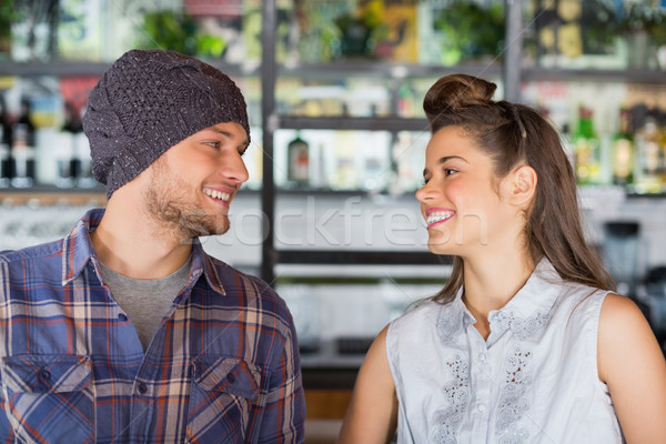 Barátok néz egyéb étterem mosolyog nő Stock fotó © wavebreak_media