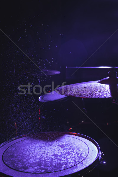 Wet drum kit in illuminated nightclub Stock photo © wavebreak_media