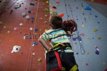 Determined woman practicing rock climbing Stock photo © wavebreak_media