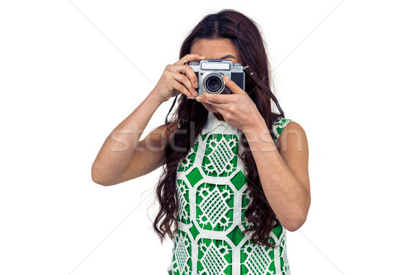 Asian woman taking picture with digital camera Stock photo © wavebreak_media