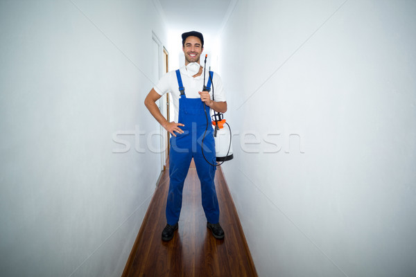 Portrait of confident pesticide worker standing in hallway Stock photo © wavebreak_media