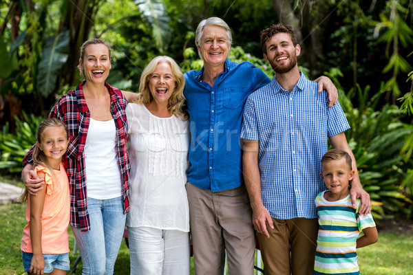 Happy multi generation family standing in yard  Stock photo © wavebreak_media