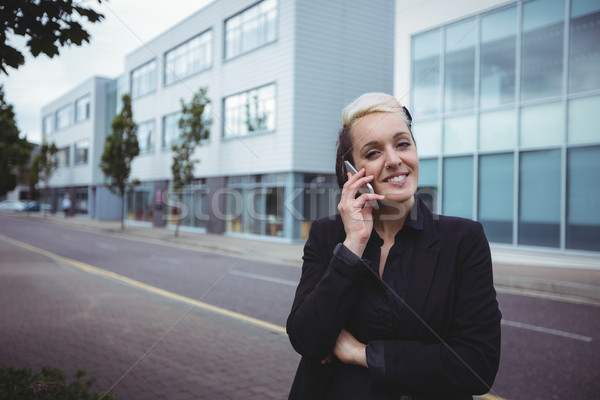Portrait of businesswoman talking on mobile phone Stock photo © wavebreak_media