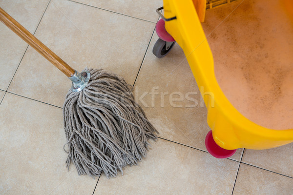 Overhead view of mop by bucket Stock photo © wavebreak_media