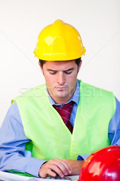 Handsome male focussing on work  Stock photo © wavebreak_media