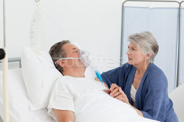 Old women taking care of her husband at home Stock photo © wavebreak_media