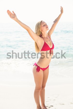 Adorable mujer posando cámara playa sexy Foto stock © wavebreak_media