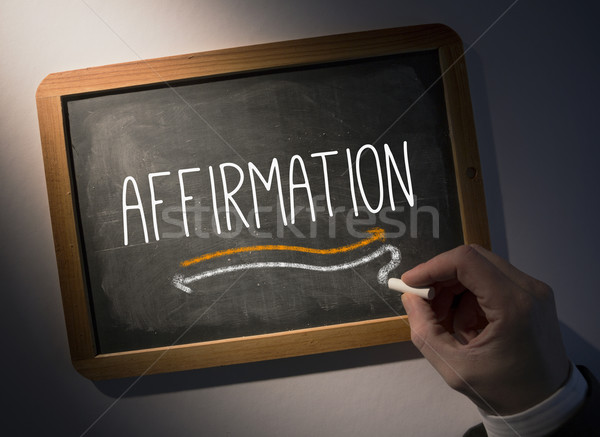 Hand writing Affirmation on chalkboard Stock photo © wavebreak_media