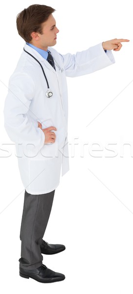 [[stock_photo]]: Jeunes · médecin · sarrau · pointant · blanche · médicaux