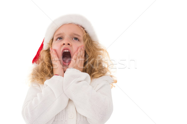 Stock photo: Festive little girl with hands on face
