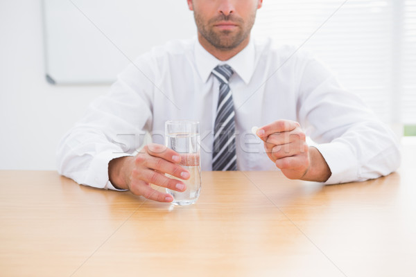 Stockfoto: Ernstig · zakenman · glas · water · tablet