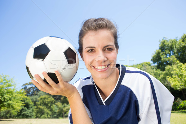 Csinos futballista mosolyog kamera napos idő nő Stock fotó © wavebreak_media
