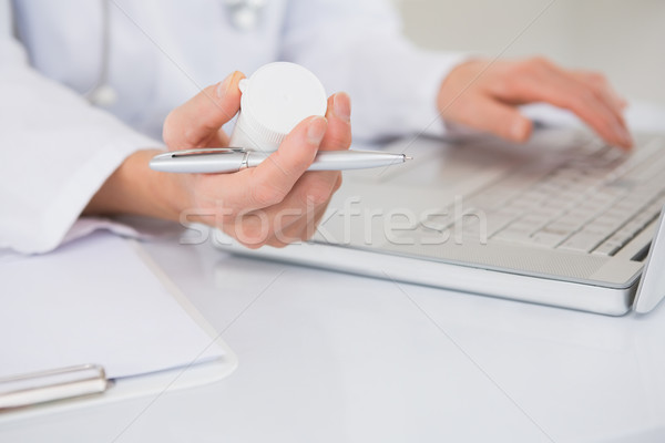 Veterinarian typing on keyboard the prescriptions  Stock photo © wavebreak_media