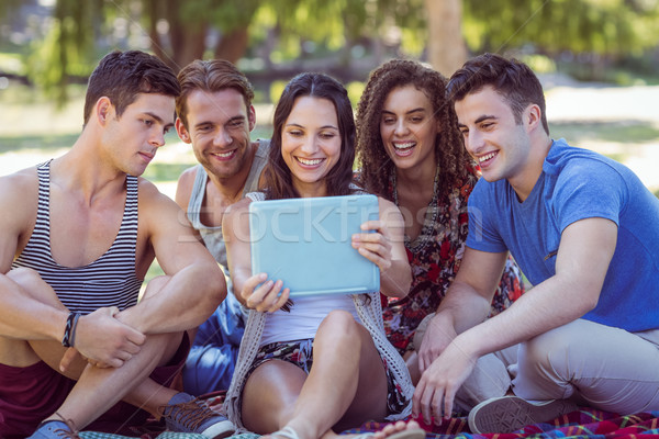 Friends looking at their selfies  Stock photo © wavebreak_media