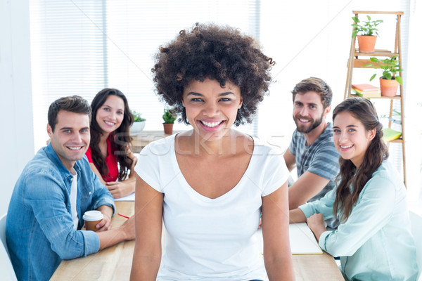 Jeunes Creative femme d'affaires souriant caméra portrait [[stock_photo]] © wavebreak_media