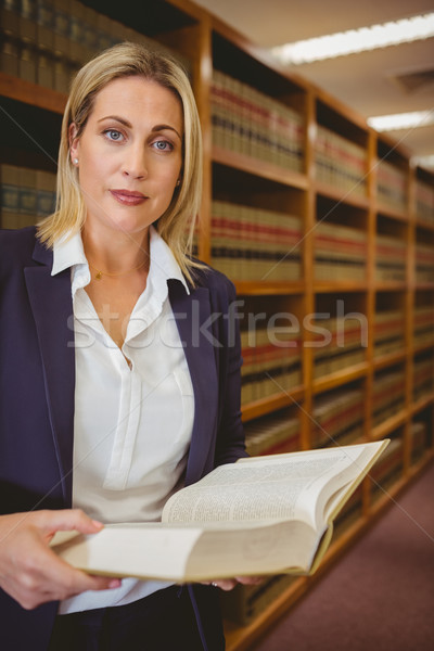 серьезный библиотекарь чтение книга библиотека женщину Сток-фото © wavebreak_media