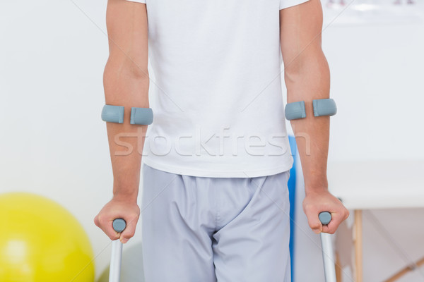 Patient standing with crutch  Stock photo © wavebreak_media