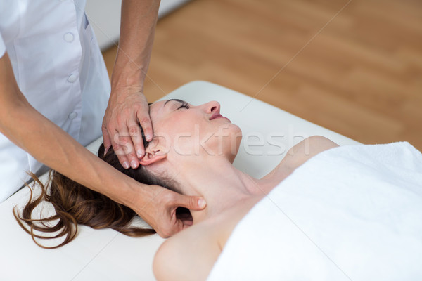 Physiotherapist doing neck massage  Stock photo © wavebreak_media