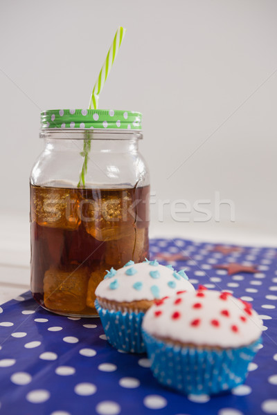 Stock photo: Close-up of drink and cupcake with 4th july theme