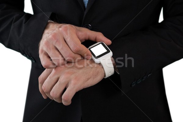 Mid section of businessman using smart watch Stock photo © wavebreak_media