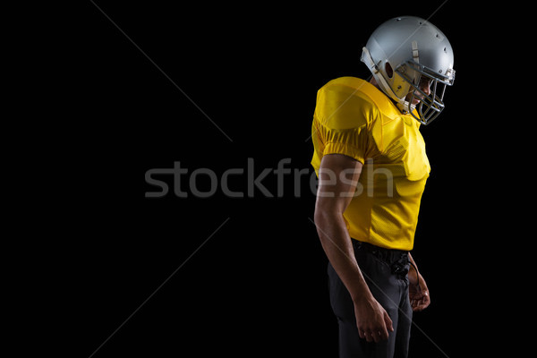 американский футболист Постоянный черный профессиональных шлема Сток-фото © wavebreak_media