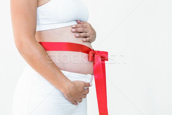Kobieta w ciąży około biały czerwony Zdjęcia stock © wavebreak_media