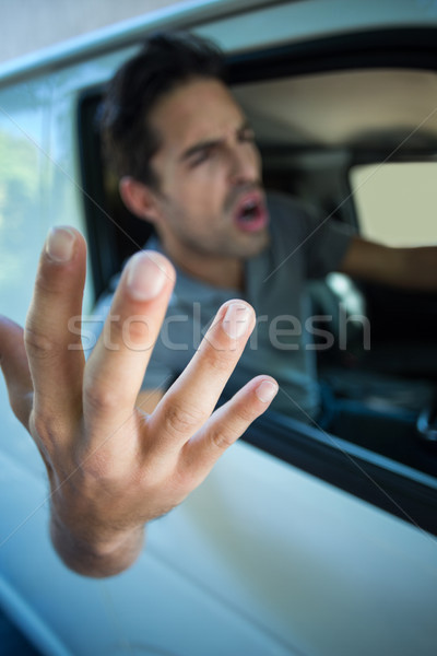 Angry young man gesturing Stock photo © wavebreak_media