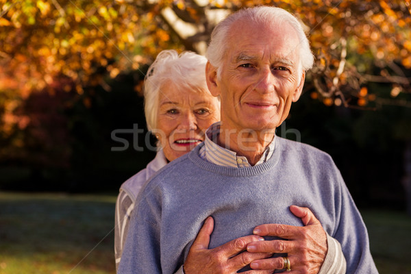 Couple de personnes âgées femme derrière parc arbre [[stock_photo]] © wavebreak_media